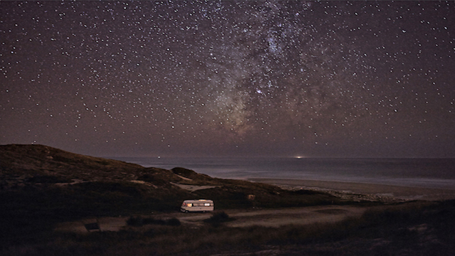 Absolutely Amazing Photos Of A Lone Van Gazing At Starry Skies